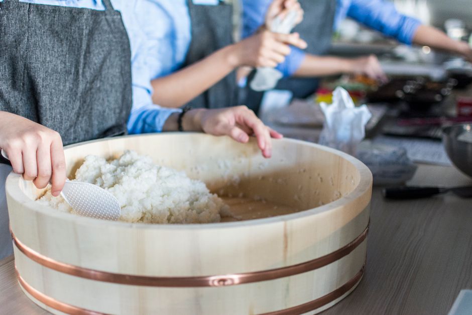 Rinsing rice in a bowl of water