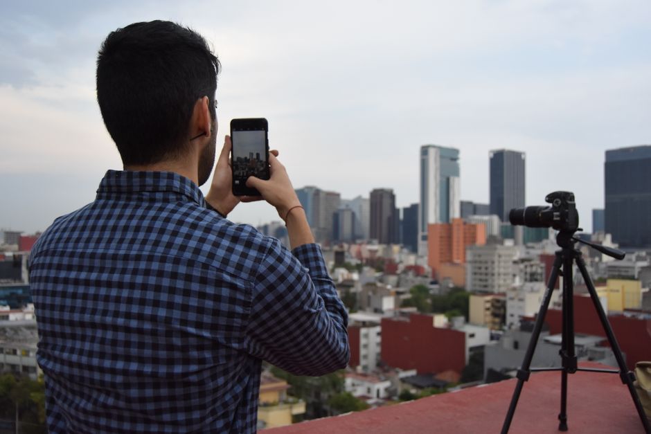 Person taking photo with smartphone