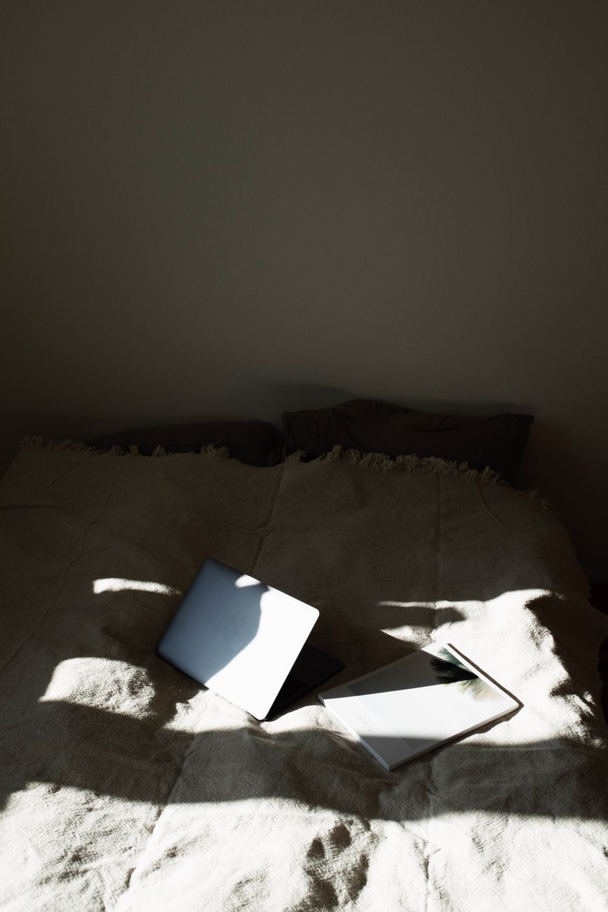 laptop overheating, bed, ventilation, cooling pad, dust