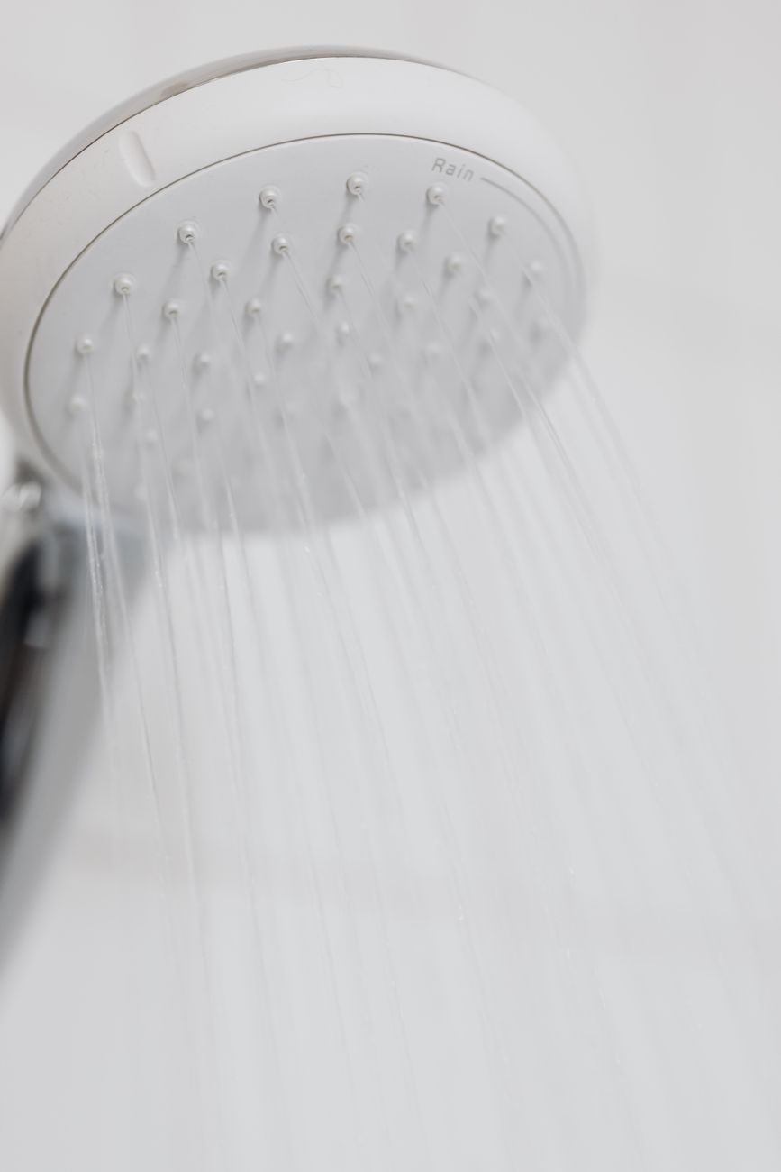 unclog shower head, clean shower head, remove mineral deposits