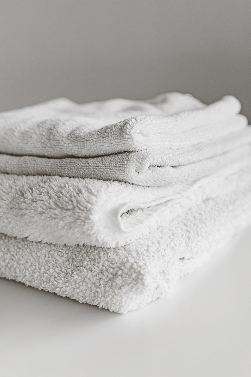 fold towels, thirds, linen closet, space saving, hotel fold