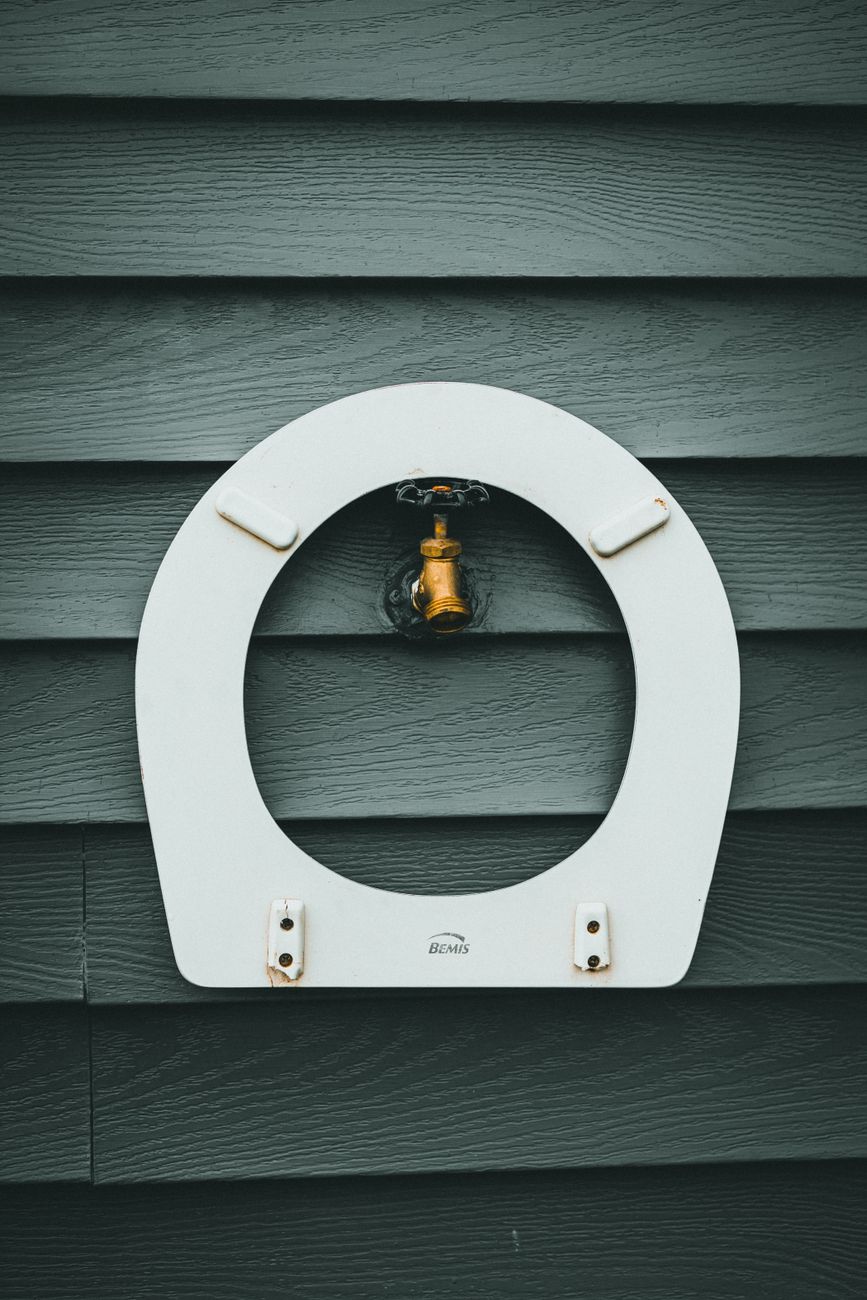 unclog toilet, dish soap, hot water, baking soda vinegar, plunger alternative