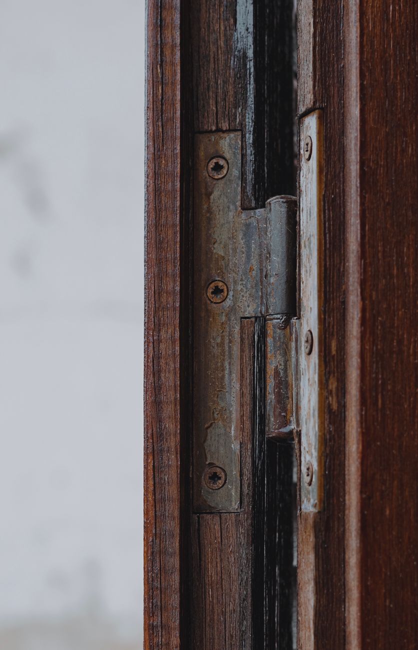door hinge, stripped, screw, toothpick, frame