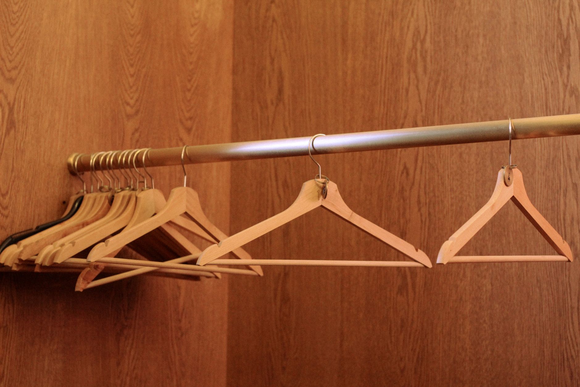 closet declutter, hanger reversal, wardrobe organization, minimalist, purge clothes