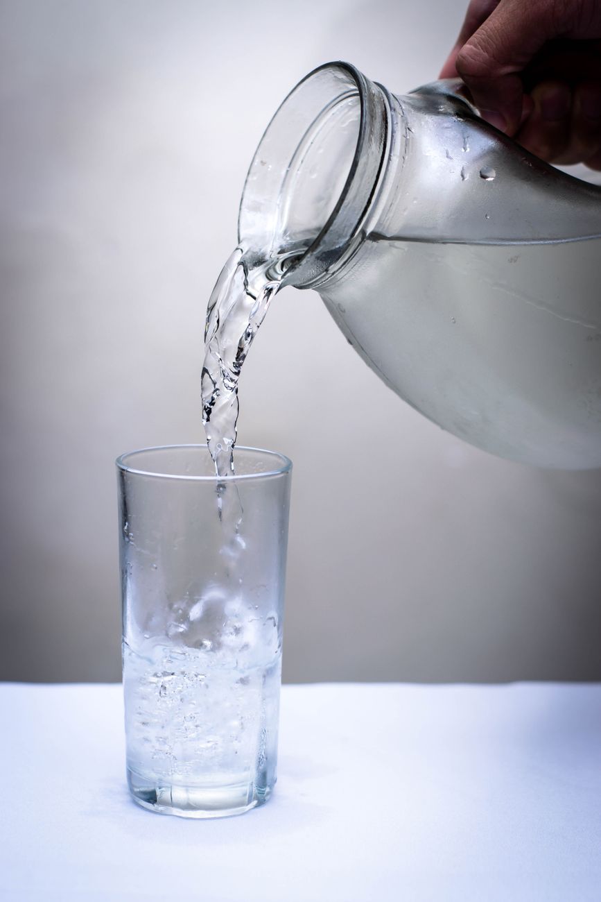 water intake, hydration hack, drink water habit, flavored water, health tip