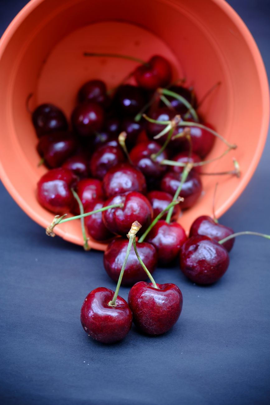 pit cherries, chopstick, cherry pitter, paperclip, kitchen gadget hack