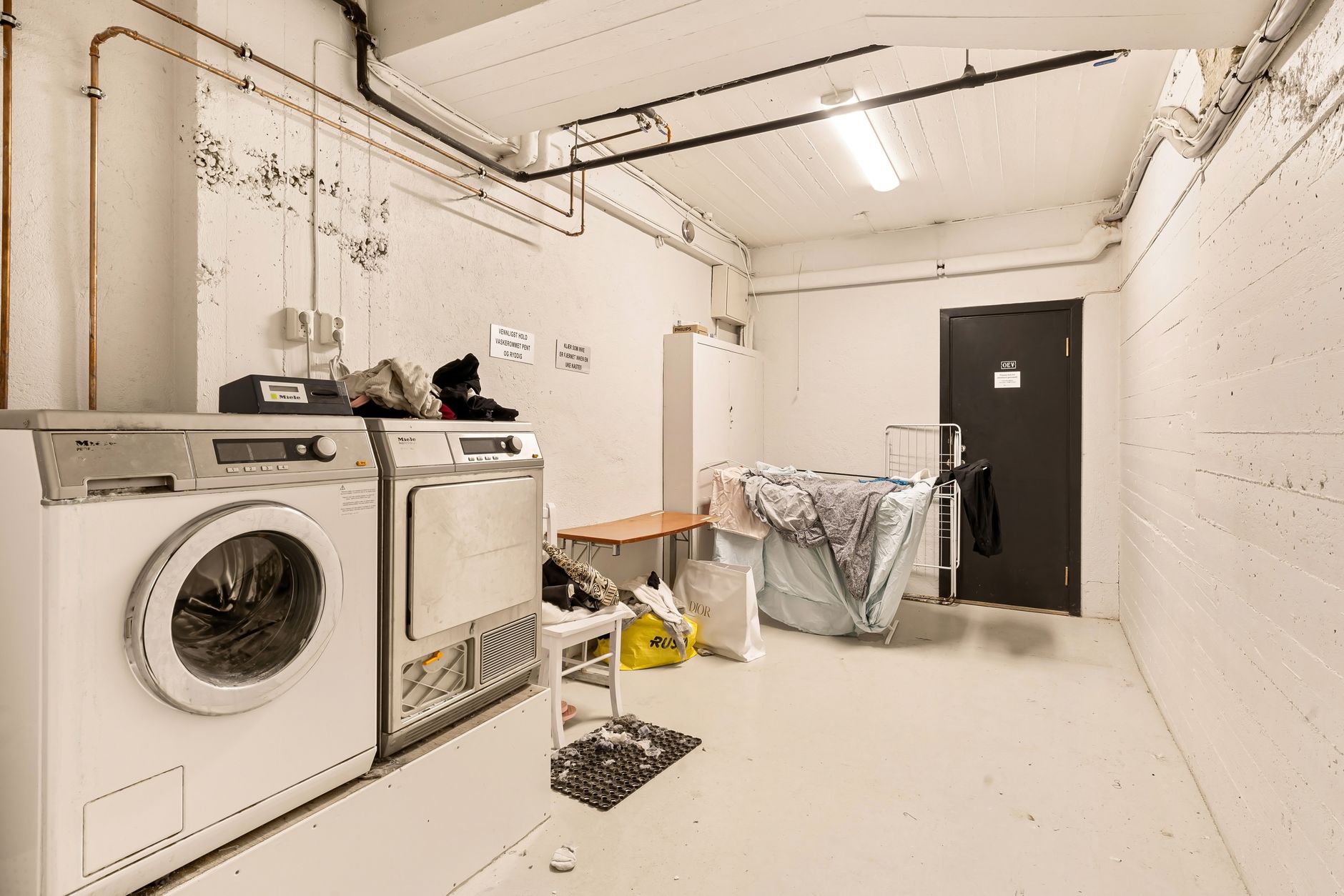 washing machine level, wobbly washer, leveling feet, washer walking, laundry room fix